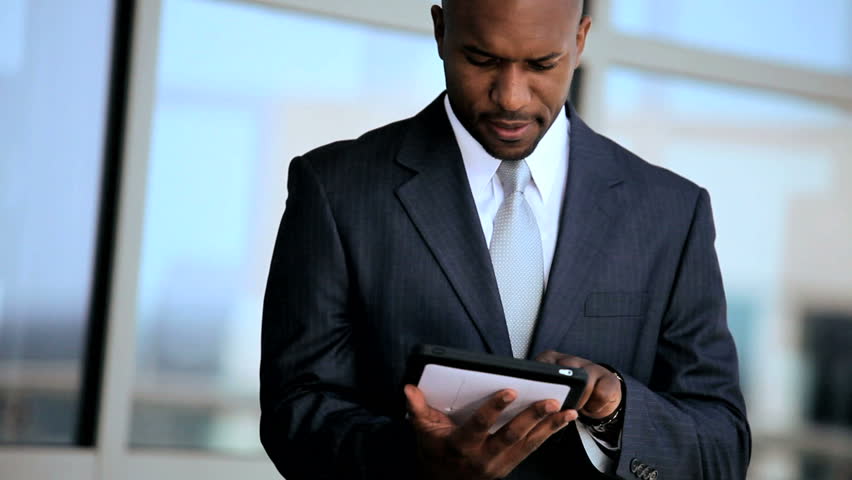 business executive using a tablet